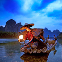 Yangshuo guide, cormorant fisherman