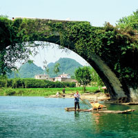 Yangshuo fun guide, old bridge across stream