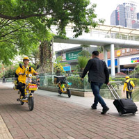 Shenzhen business travellers guide - electric scooters buzz through Futian