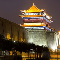 Xian fun guide for families, the city wall and gate lit up at night