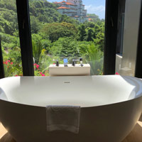 Bali luxury resorts review, Apurva Kempinski soaking tub by window