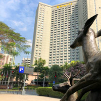 Shangri-La Makati with bronze deer in the park
