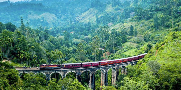 Sri Lanka resorts review from beaches to hilly tea estates - train chugging through the hill country
