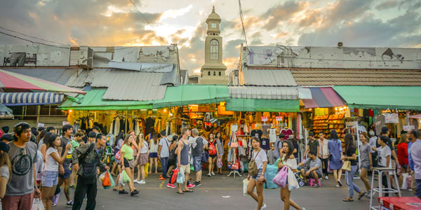Bangkok fun shopping guide - Chatuchak Weekend Market at dusk packed with tourists