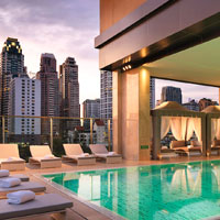 A breezy open-air pool serves up big views from Oriental Residence
