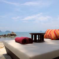 Krabi resorts review, Phulay Bay, a Ritz-Carlton Reserve, sunning divan by the beach