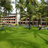 Kata Thani Phuket Beach Resort with its lawns and beachfront is favoured by Europeans
