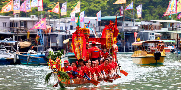 During the annual Dragon Boat festival, colourful processions pass through village waterways - photo: David Sutton