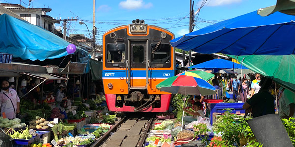 Train pulls into Samut Sakhon Market - Photo: Richard Barrow