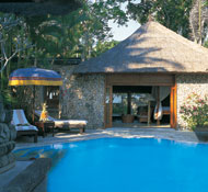 Sunny pool at Raffles, a top Angkor heritage hotel