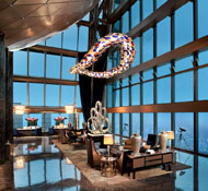 Bring along your luggage - the butlers will deal with it all - lobby view at night