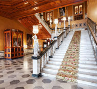 Marble staircases and artefacts set the tone at this Indian heritage hotel