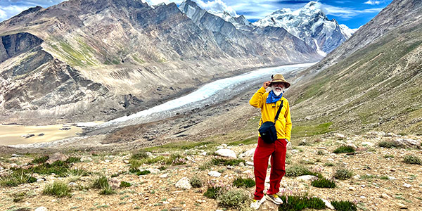 Mandip Singh pauses at Pensi La (pass) above the Zanskar River just after Rangdum