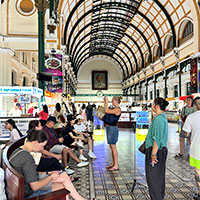 The historic Saigon Central Post office with its vaulted ceiling is a must-see