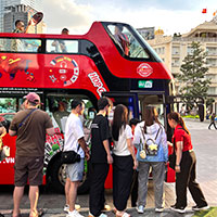 Saigon red city tour buses start near the Opera House