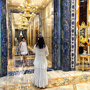 Reverie Saigon's ornate marble lift lobby attracts Instagram posers